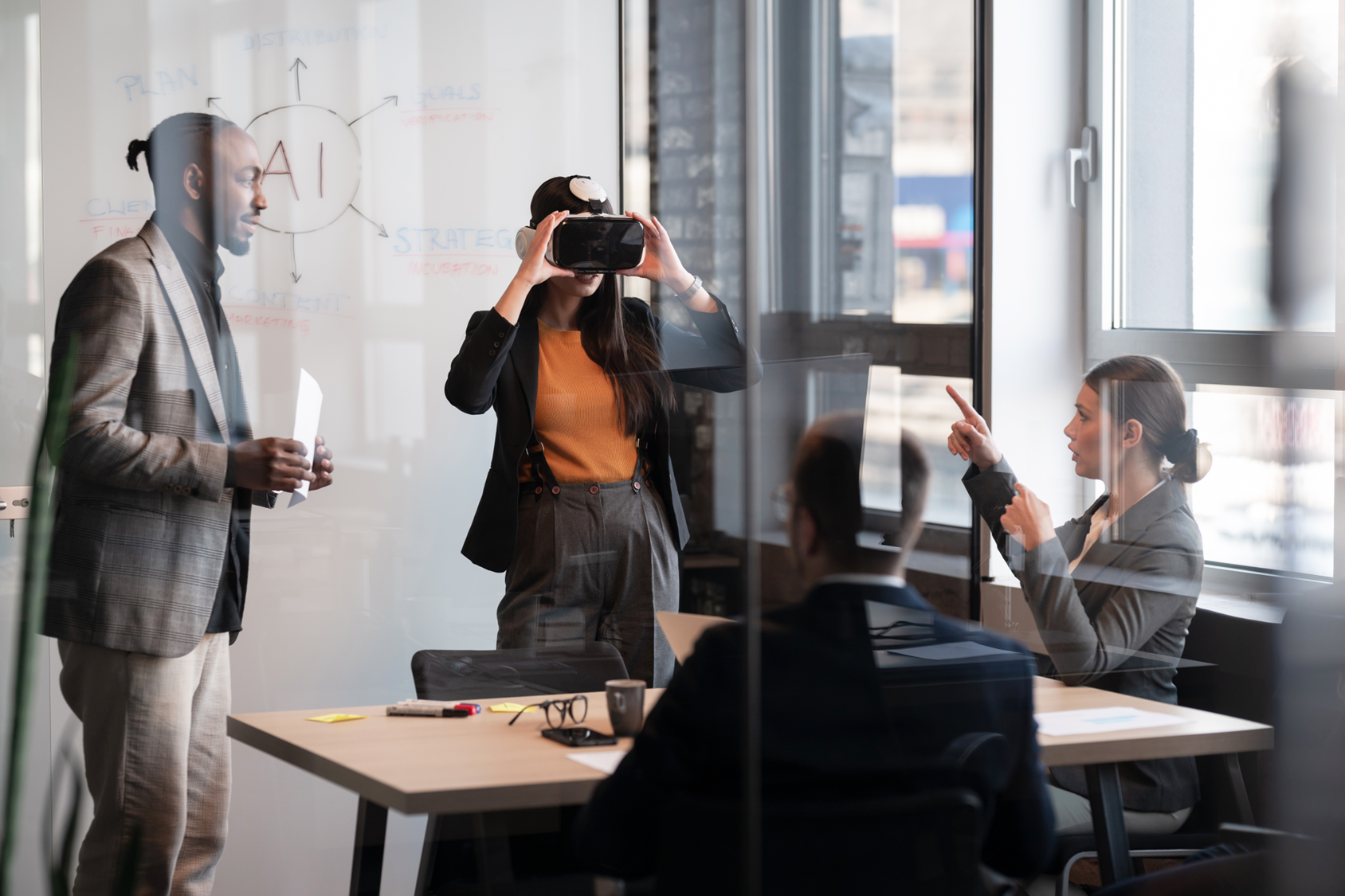 Team collaborating with VR and AI strategy on a glass wall